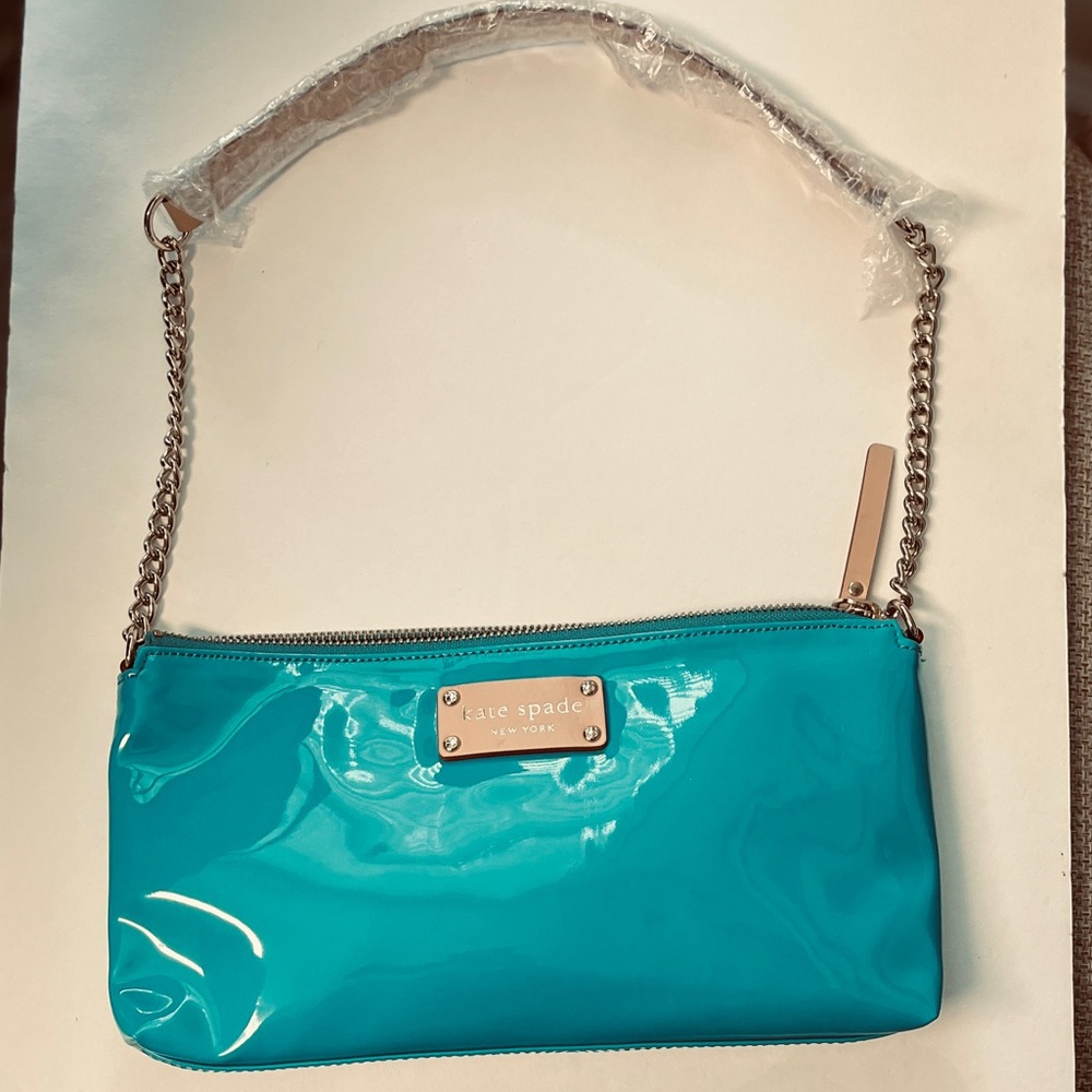 Kate Spade EUC, Teal PVC purse, COA Approx 11”x5.75” body. Strap 24.5”, Clean